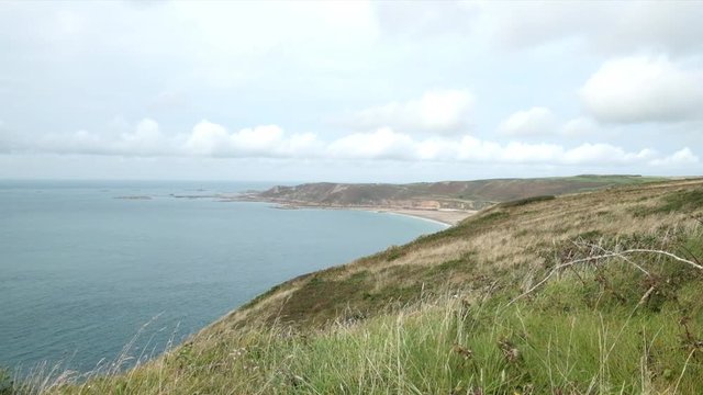 Goury coast with flowers and wind