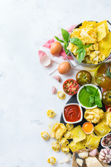 Italian food and ingredients, ravioli pasta spaghetti pesto tomato sauce