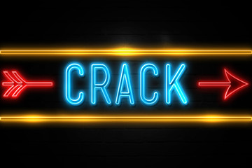 Obraz premium Crack - fluorescent Neon Sign on brickwall Front view