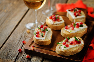 Pomegranate Brie balsamic crostini