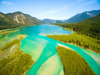 Aerial view on Isar River that flows to Sylvenstein Lake in Bavarian Alps near Garmisch...