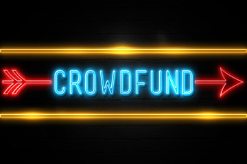 Fototapeta premium Crowdfund - fluorescent Neon Sign on brickwall Front view