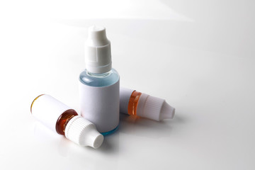 Isolated e liquid bottles for vape devices on a white background