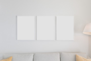 Set of 3 Blank Poster Frames in a Living Room