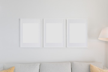 Set of 3 Blank Poster Frames in a Living Room
