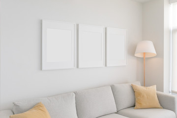 Set of 3 Blank Poster Frames in a Living Room