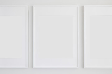 Set of 3 Blank Poster Frames in a Living Room