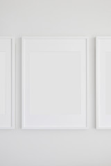 Set of 3 Blank Poster Frames in a Living Room