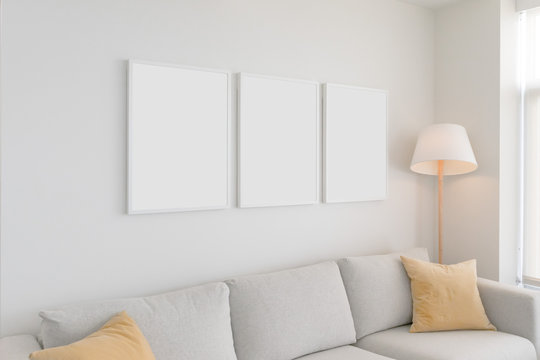 Set of 3 Blank Poster Frames in a Living Room