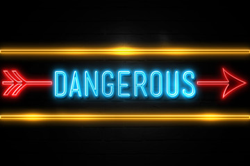 Dangerous  - fluorescent Neon Sign on brickwall Front view