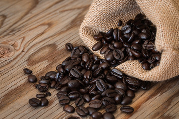 Roasted coffee beans in a sack.