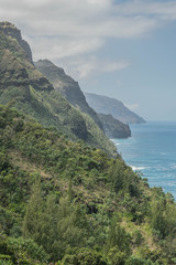 Fototapeta na wymiar Part of the Napali Coastline on a hazy day, taken from the Kalalau Hiking Trail, on Kauai
