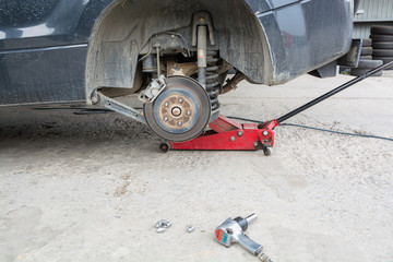 The rear of the car without the wheels.