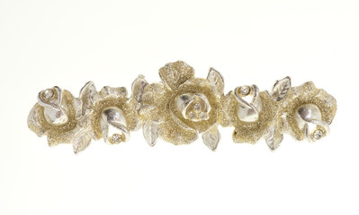 flower brooches on white background