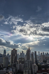 city buildings with shining cloud