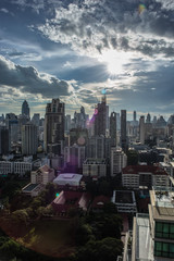 Obraz premium city buildings with shining cloud