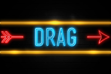 Drag  - fluorescent Neon Sign on brickwall Front view
