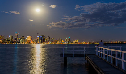 Full moon over Perth skyline