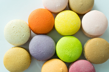 Fototapeta na wymiar Colorful macarons line-up on white backgound