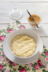 Rice milk porridge with vanilla and sugar. Breakfast.