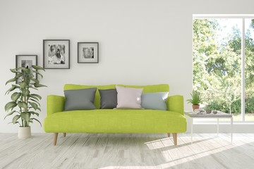 Idea of white room with sofa and summer landscape in window. Scandinavian interior design. 3D illustration