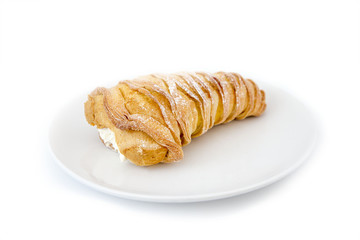 Italian pastry. sweet lobster tail. sfogliatella riccia on the plate. isolated on white background