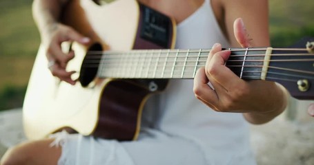 Woman Playing Guitar