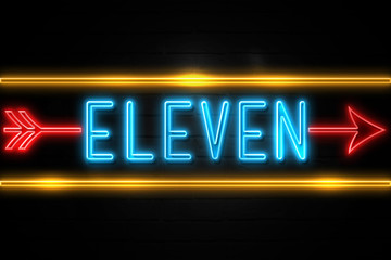 Eleven  - fluorescent Neon Sign on brickwall Front view