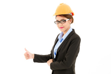 Young attractive confident asian woman, orange safety hat, glass, black suit, blue shirt on white background with thump up pose.