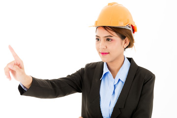 Young confident asian woman, orange safety hat, black suit, blue shirt on white pointing finger.
