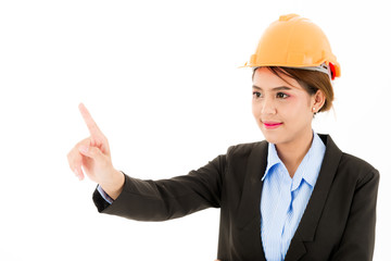 Young confident asian woman, orange safety hat, black suit, blue shirt on white pointing finger.