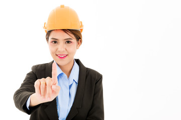 Young confident asian woman, orange safety hat, black suit, blue shirt on white pointing finger.