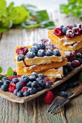 Waffles with raspberry and blueberry