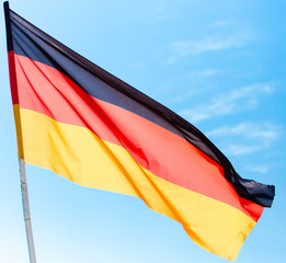 Flag of Germany against the blue sky