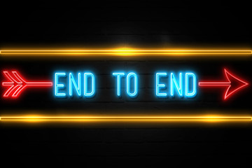 End To End  - fluorescent Neon Sign on brickwall Front view