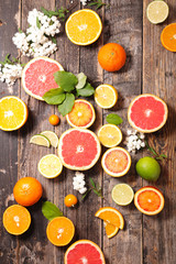 assorted fruits on wood background