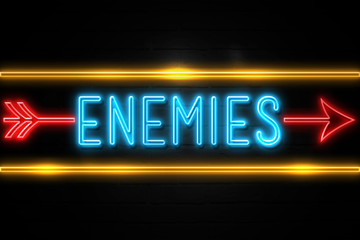 Enemies  - fluorescent Neon Sign on brickwall Front view