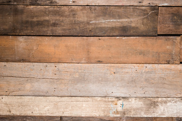 Close up top down view of wood texture of old wood use as natural background with applied vintage retro filter effect.