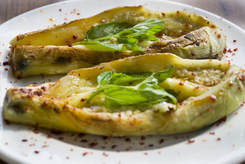 Roasted eggplant plate on wooden table
