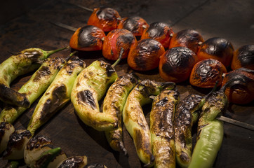 Tomato and pepper on the grill