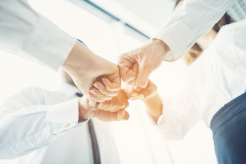 The business people greeting with a fist