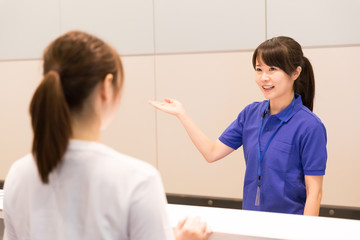 attractive asian woman in sports gym
