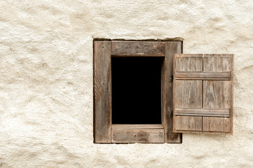 Wooden window of an old farming house in Austria