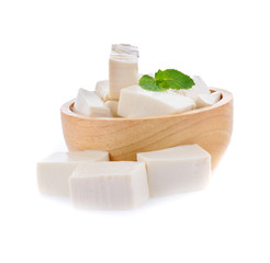Tofu in wood bowl  isolated on white background