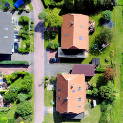 New building settlement with houses and properties with gardens, aerial photo