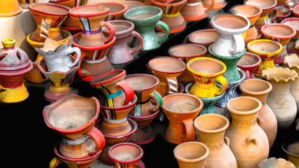 Colorful clayjugs at a marketplace in Oman