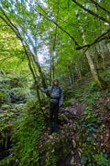 Naklejka na ściany i meble Teenager hiker on a trail