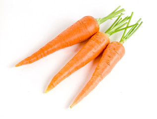 Carrot vegetable with leaves isolated on white background