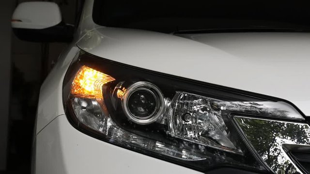 footage of blink car headlight