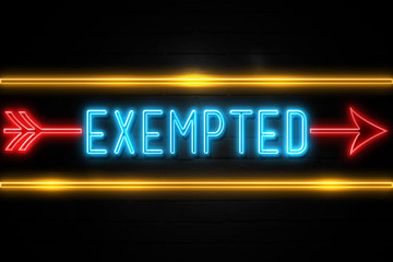 Exempted  - fluorescent Neon Sign on brickwall Front view